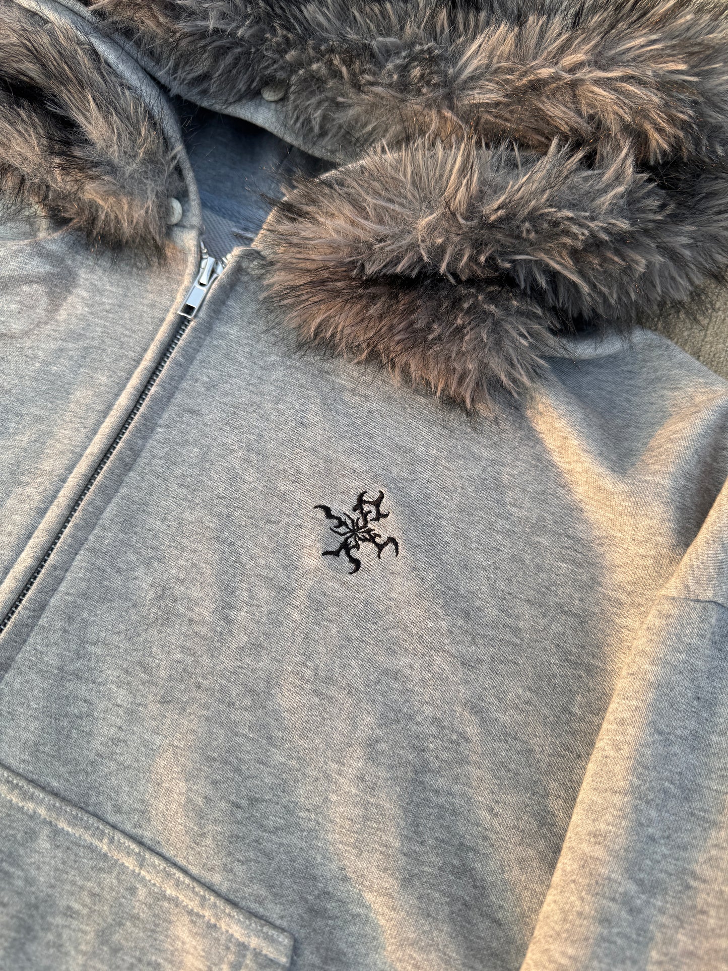 “batsh*t” zip up