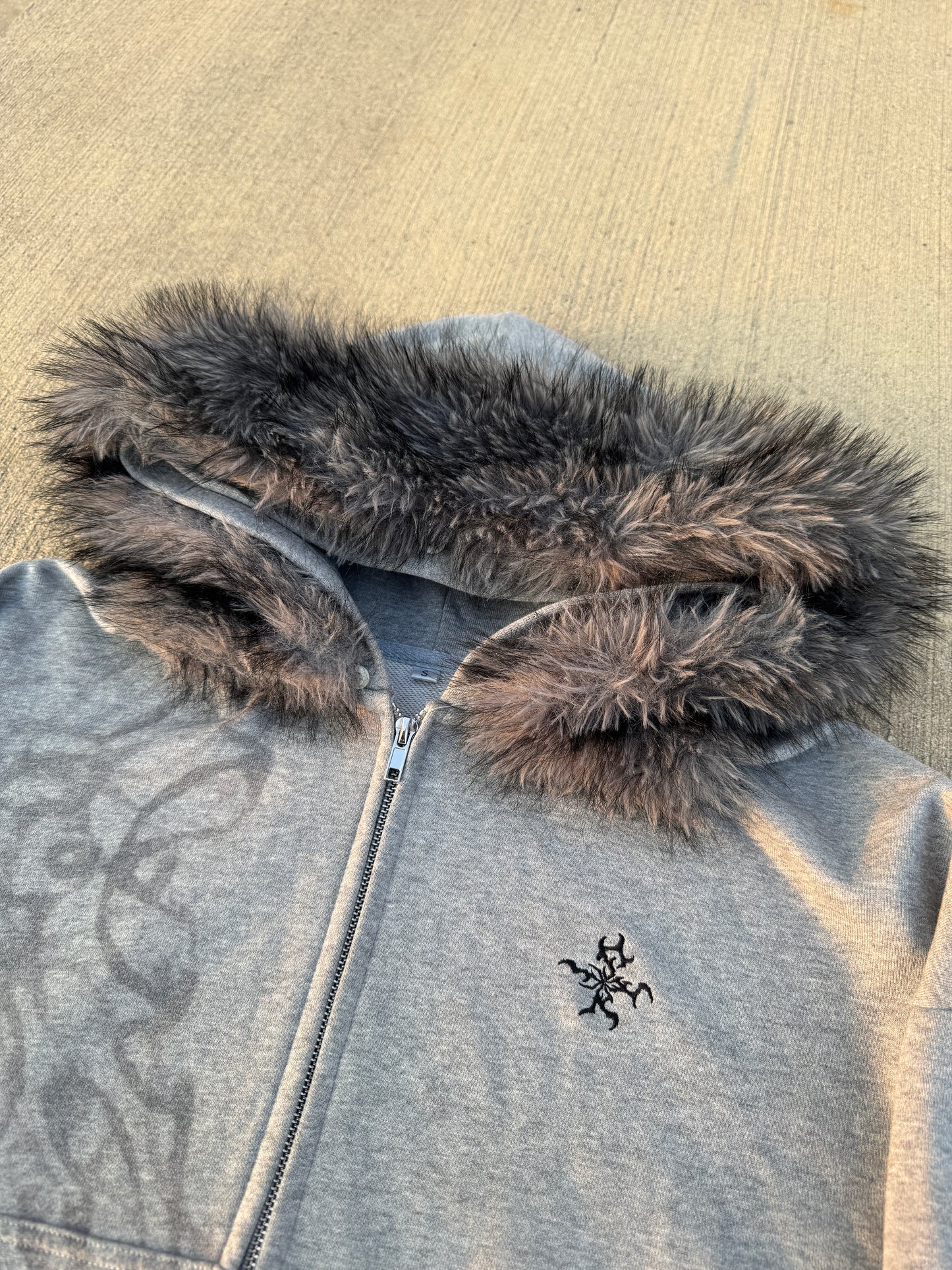 “batsh*t” zip up