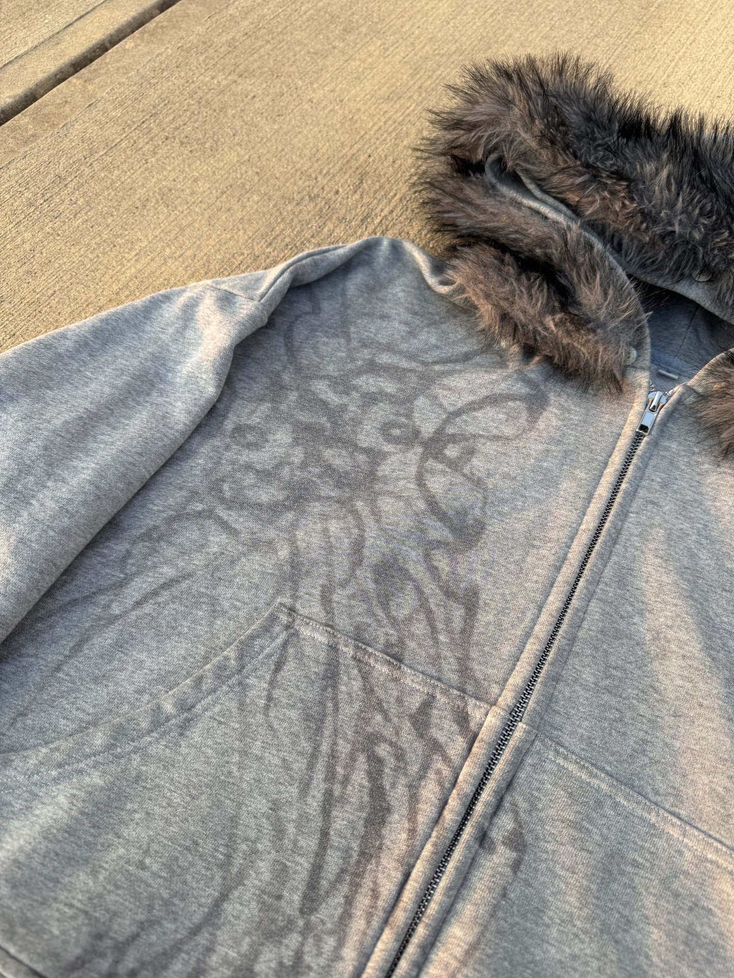 “batsh*t” zip up